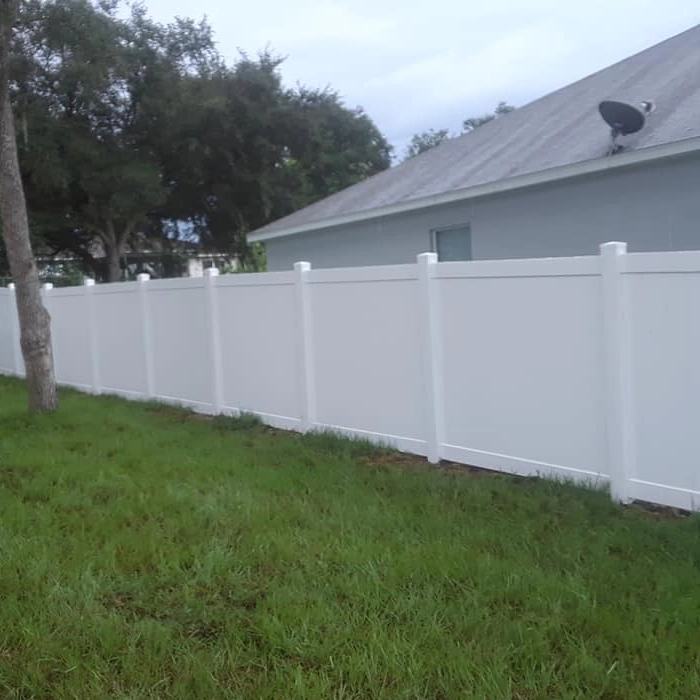 white fence newly installed in backyard orlando fl